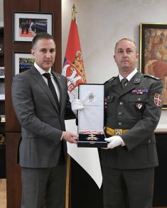 Minister Stefanović awards Order of Merit in Defence to hero of Battle of Košare