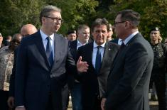 President Vučić and King Mswati III inspect the display of a part of arms and military equipment