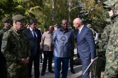 President Vučić and King Mswati III inspect the display of a part of arms and military equipment