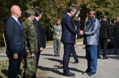 President Vučić and King Mswati III inspect the display of a part of arms and military equipment