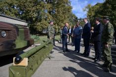 President Vučić and King Mswati III inspect the display of a part of arms and military equipment