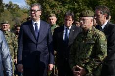 President Vučić and King Mswati III inspect the display of a part of arms and military equipment