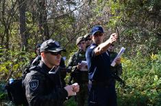 Military Academy cadets, University of Criminal Investigation and Police Studies students march together