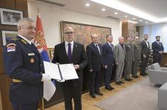 Minister Vučević presents decree of appointment to new director of Defence Inspectorate