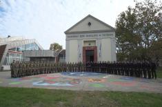 Military Academy cadets, University of Criminal Investigation and Police Studies students march together